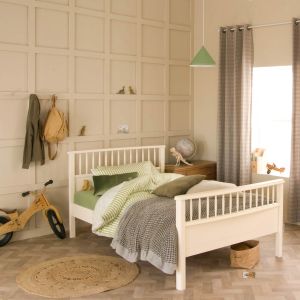 cream ivory white spindle hardwood small double bed, in green and beige themed child's bedroom 