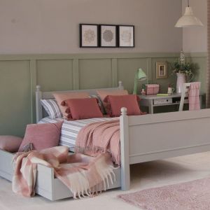 grey bed with trundle pulled out 