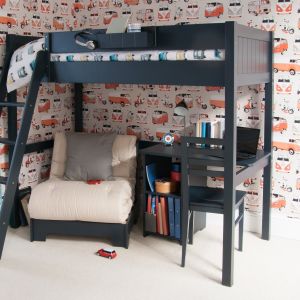 Navy blue bunk bed with futon and storage desk underneath, in a vintage car themed bedroom