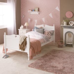 White, heart kids bed, pink and neutral bedroom 